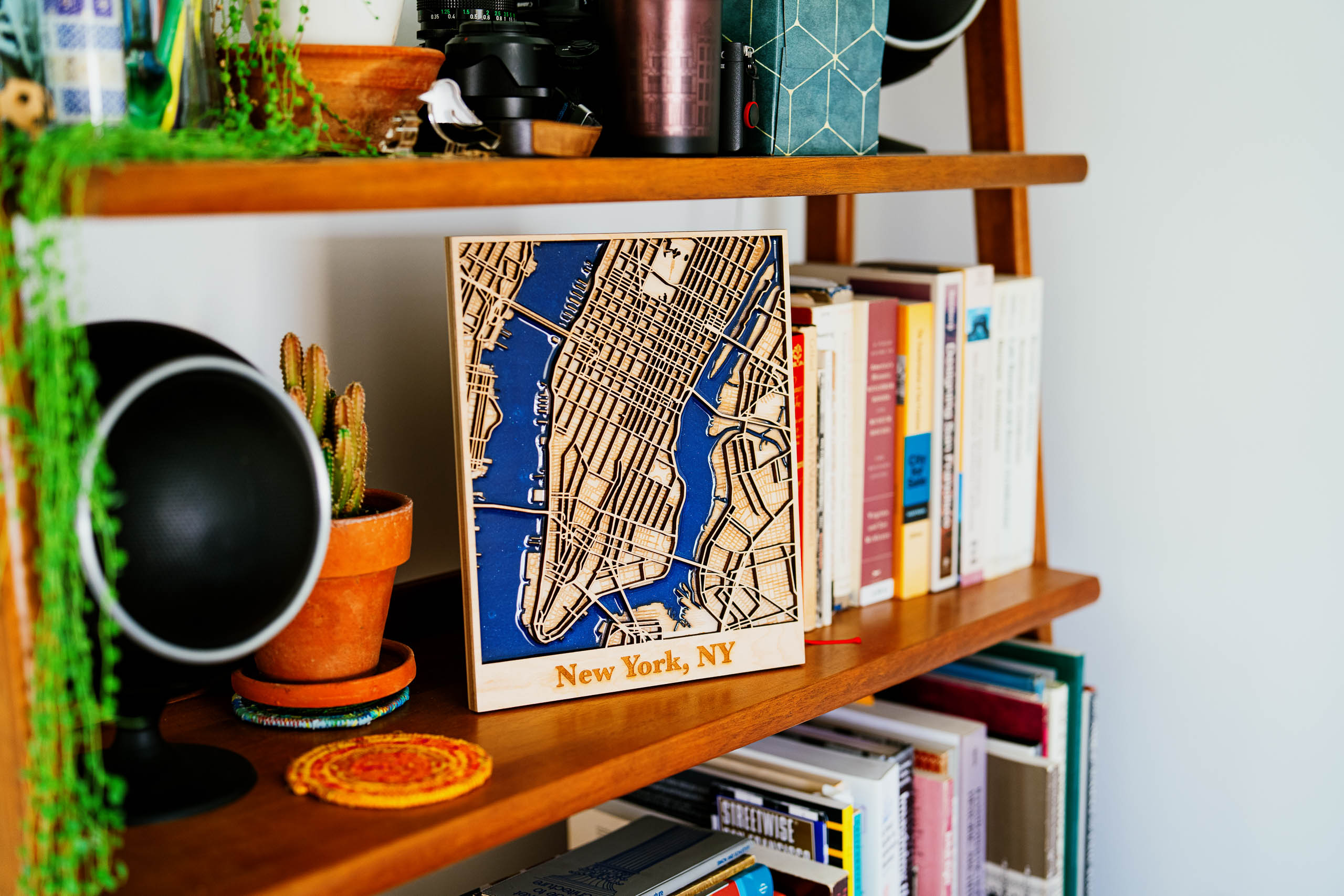 NYC map on a bookshelf