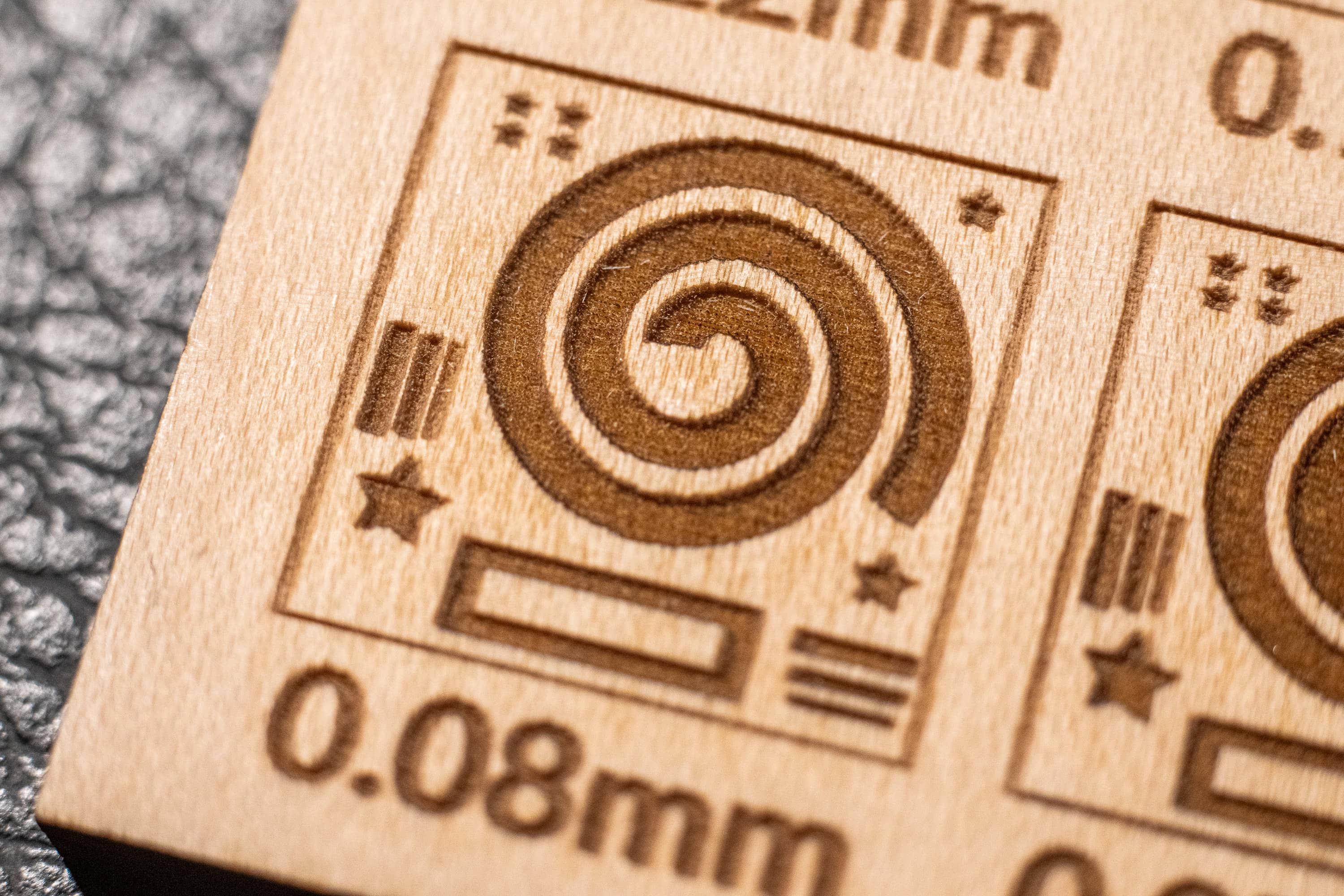 Macro photo of the line interval test on plywood