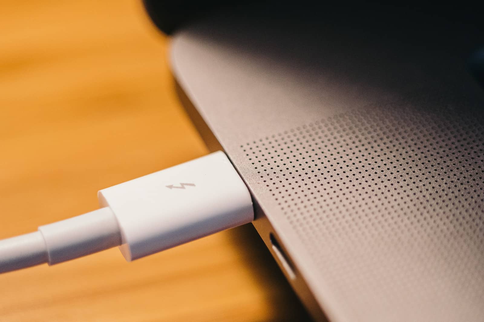 Thunderbolt 3 cable plugged into a MacBook Pro (2019)
